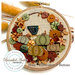 A image of the finished project attached to a hoop and staged with fall decor