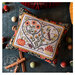 The finished pillow surrounded by coordinating décor. 
