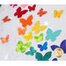 Colorful fabric butterfly shapes on a white background