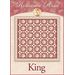 A quilt design featuring a romantic rose pattern in shades of red and cream, with a decorative border. The text prominently displays King at the bottom, and the top includes the words Romantic Roses along with floral accents.