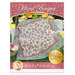 Turquoise and pink patchwork quilt from squares and half-square triangles. 
