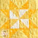 The third yellow and white block in the Learn to Quilt Beginner Quilt