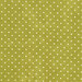 green fabric with off white polka dots