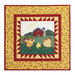 Quilt with a yellow floral border featuring three chickens and a chick in front of a barn.