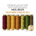 Image shows a collection of thread spools in various colors for a Wooly Mug Rugs November Thread Set. There are seven spools arranged in a row, featuring shades of burgundy, yellow, green, and gold, with the text Wooly Mug Rugs and November Thread Set above.