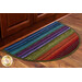 A colorful, half-oval area rug with stripes in various colors, including blue, purple, green, and red, placed under kitchen cabinetry on a wooden floor.