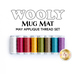 Image showing a collection of sewing thread spools in various colors arranged in a row of 8. The text above reads WOOLY MUG MAT and MAY APPLIQUE THREAD SET. A logo from Shabby Fabrics is visible at the bottom right corner.