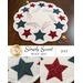 The wool Simply Sweet Mat for July featuring red and blue patriotic shooting stars on white wool 