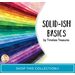 A rainbow collage of fanned fabrics included in the Solid-Ish Basics collection