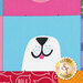 A colorful fabric with a cartoon-style illustration of a white dog’s face against a blue background, featuring a smiling expression with a pink tongue. The fabric includes various vibrant patterns and a logo in the corner that reads Shabby Fabrics.