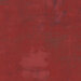 Dark red grunge textured fabric