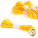 Five bundles of yellow elastic cord are neatly arranged, each secured with a white tie.