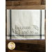 A vintage style dish towel with hand embroidered floral motifs and the words 