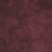 A textured fabric featuring a deep burgundy color with subtle variations and a soft appearance.