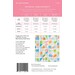 Back cover of a quilting pattern, listing material requirements and a colorful quilt design.