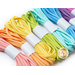 A collection of colorful elastic cords wrapped in white bands, featuring various pastel shades including pink, orange, yellow, green, blue, and purple.