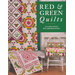 The front of the Red & Green Quilts book, showing three of the quilts included folded on a chair while one hangs on a wall behind the chair and another is displayed over a bench next to it.