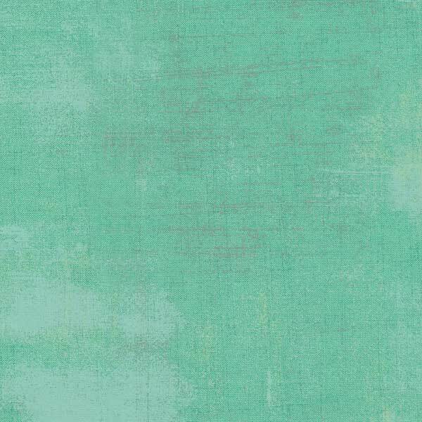 Tonal aqua grunge fabric