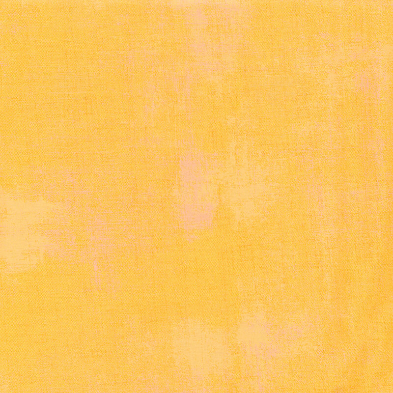 Tonal dark yellow grunge fabric