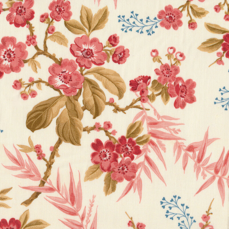 Pink and red florals and vines on a cream fabric
