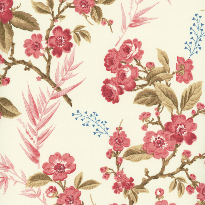 Pink and red florals and vines on a cream fabric