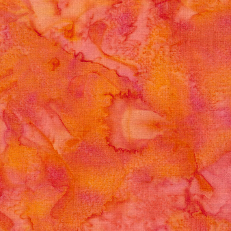 Mottled vibrant orange red batik fabric