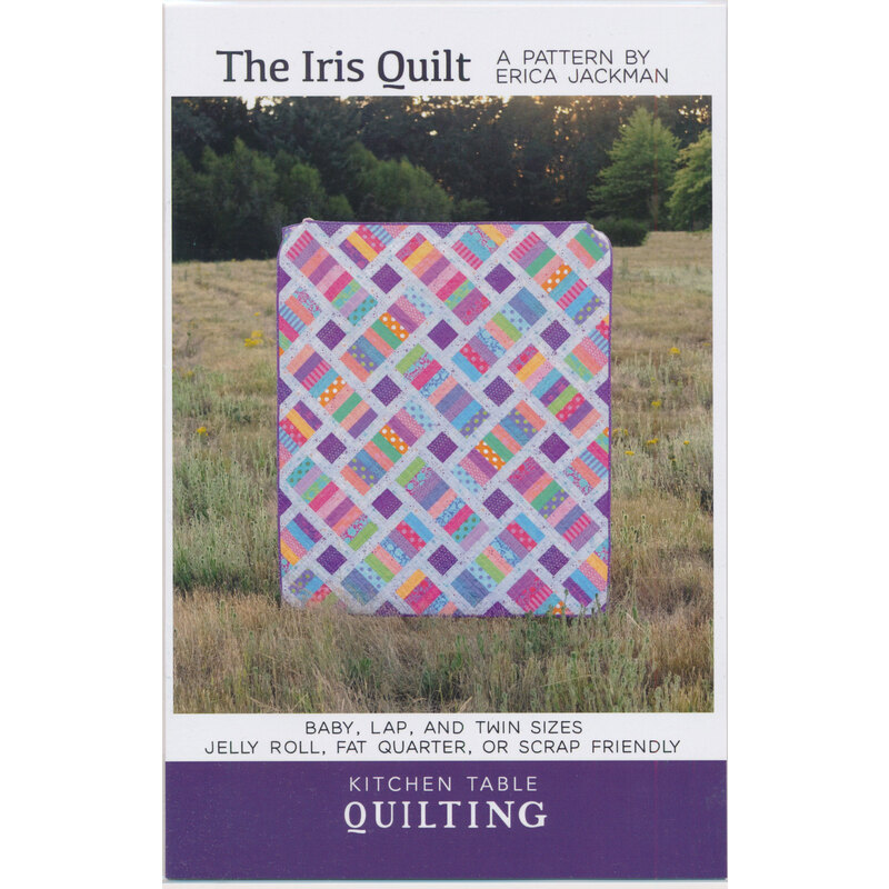 A quilt pattern titled The Iris Quilt by Erica Jackman, featuring a colorful design with a diagonal lattice pattern. The pattern is suitable for baby, lap, and twin sizes, and is compatible with jelly rolls, fat quarters, or scrap fabric. The background shows a grassy landscape.