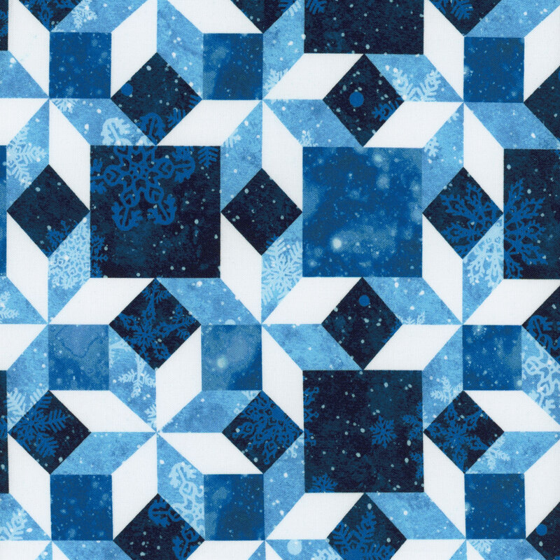Tonal blue fabric with geometric design and small snowflakes