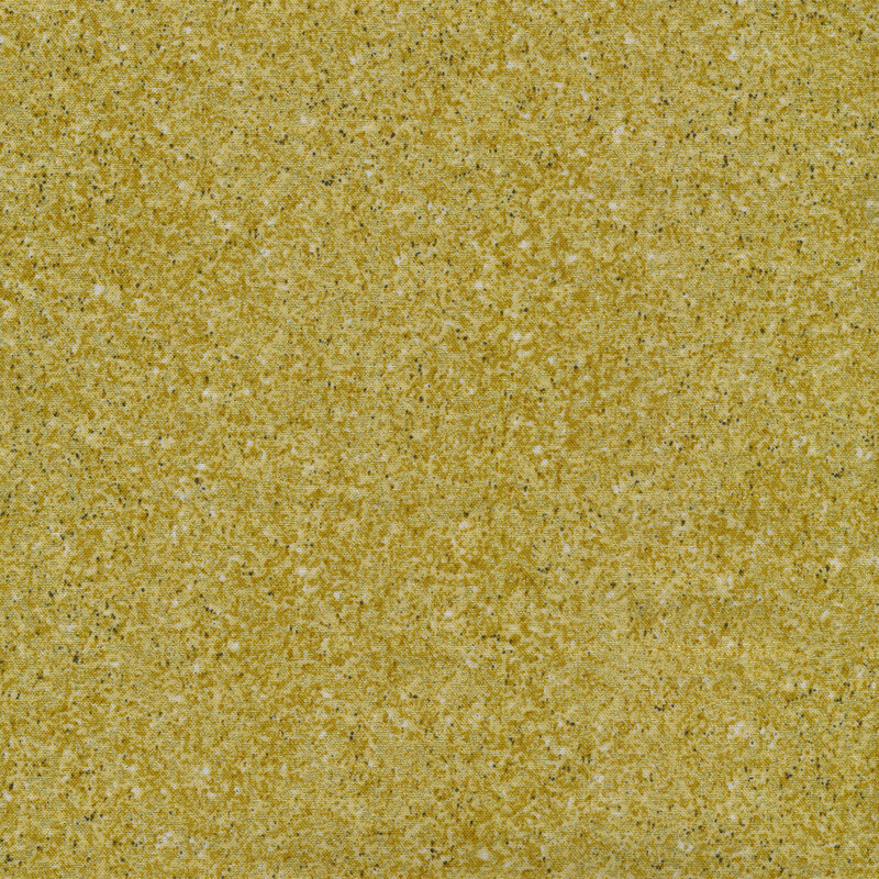 Gold, white and black flecked fabric that is subtly metallic, giving a textured, glittery effect.