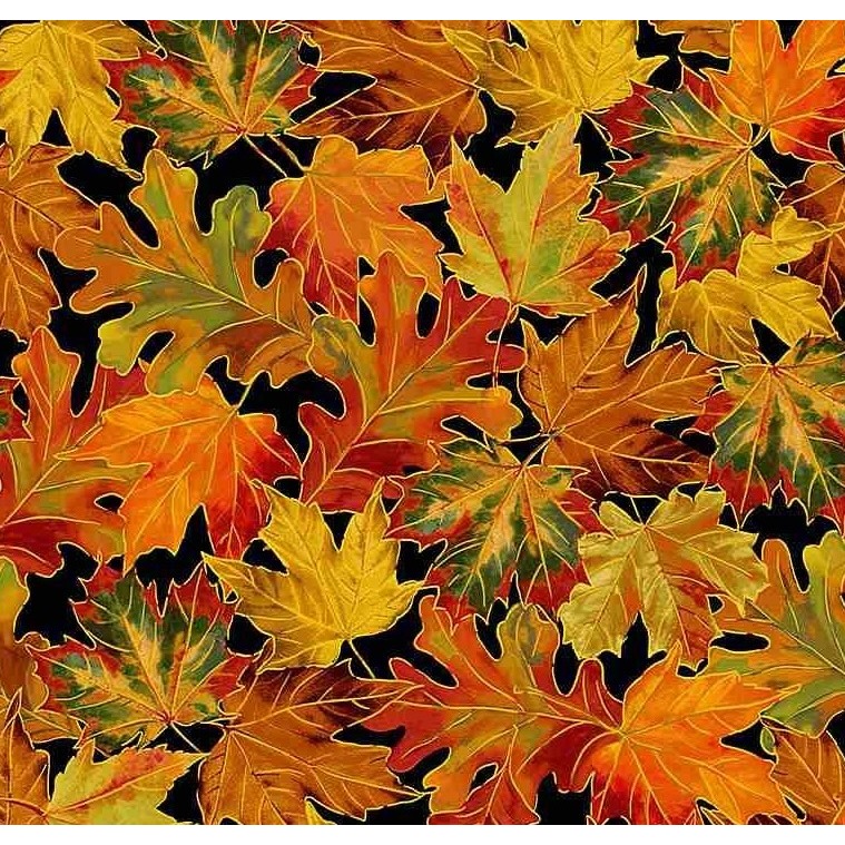 Tossed leaves with metallic accents on a black fabric background