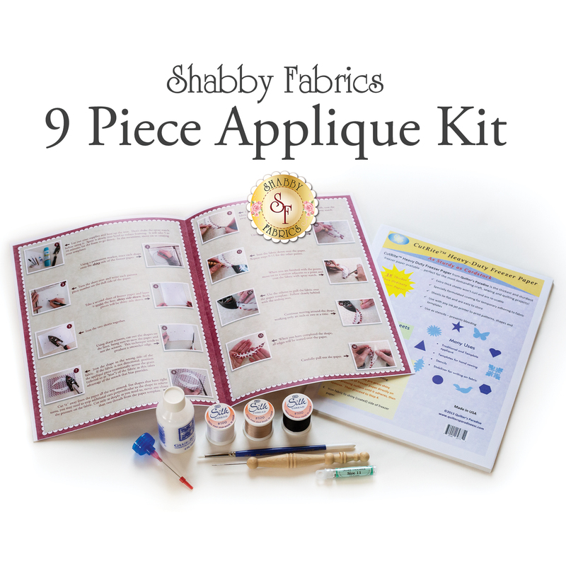 A flat lay of the Shabby Fabrics 9 Piece Applique Kit, featuring instructions, tools, and supplies.