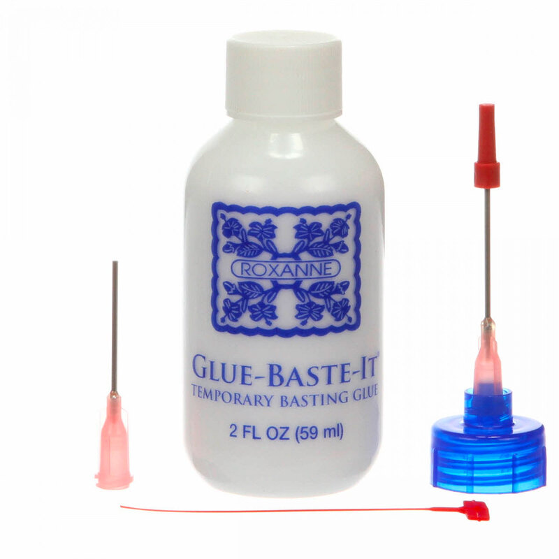 Clear bottle of Glue-Baste-It temporary adhesive, with two applicator tips beside it.