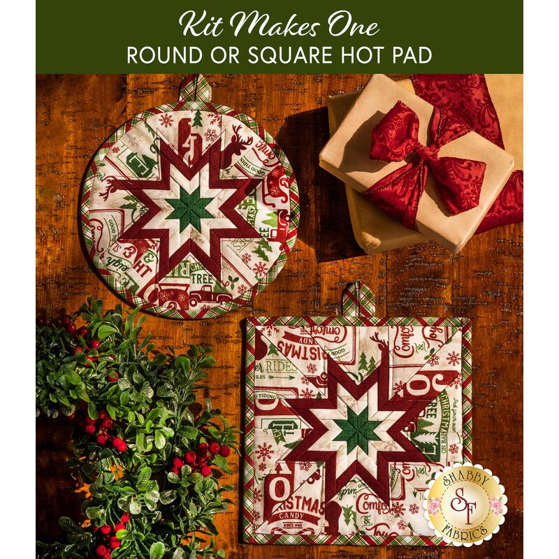 Two cream hot pads featuring holiday phrases and central folded star design on wood table.