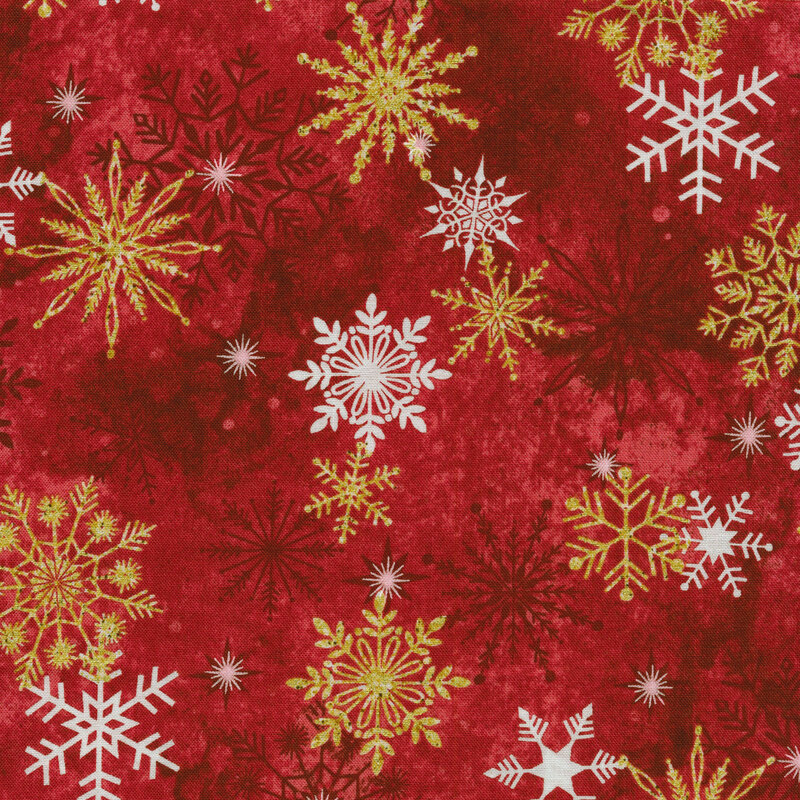 Red mottled fabric with white and metallic gold snowflakes