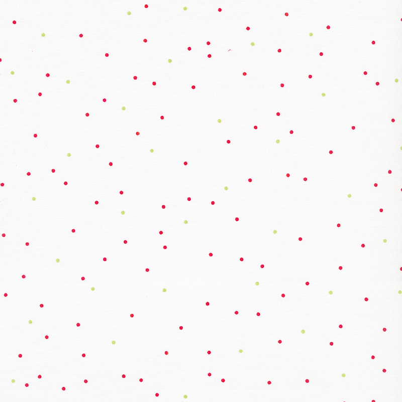 Fabric with small red and green pin dots all over a white background