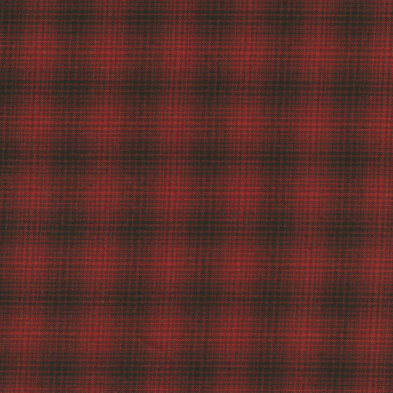 A textured pattern featuring red and black plaid.