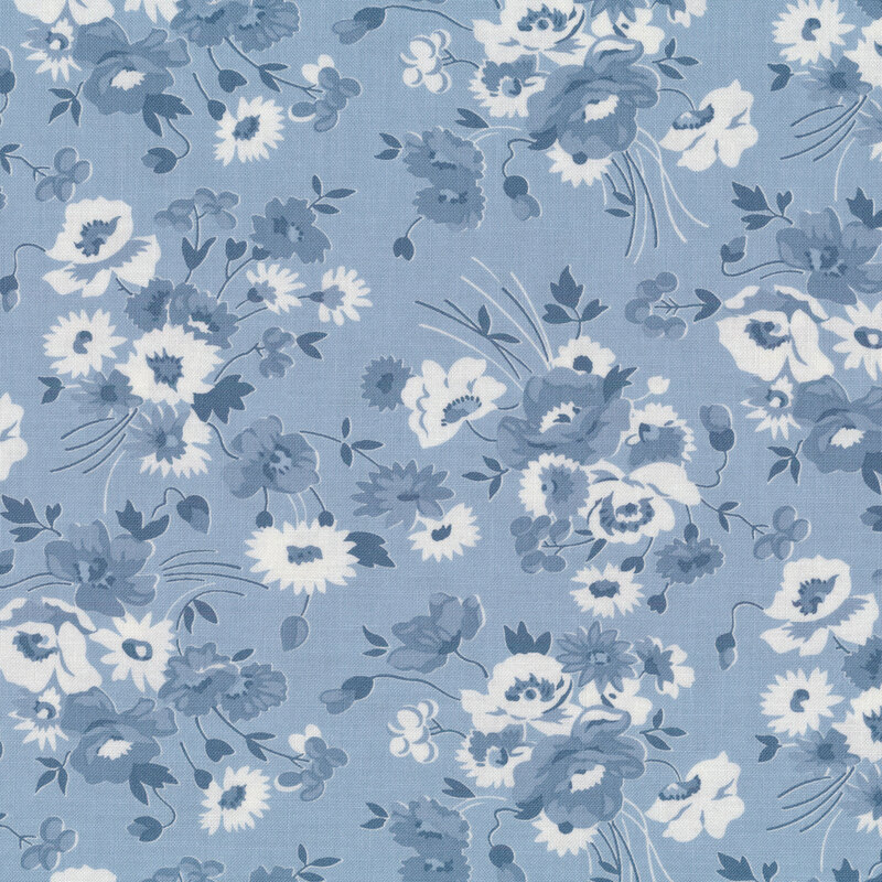 Fabric with light blue and white floral bunches tossed on a light blue background