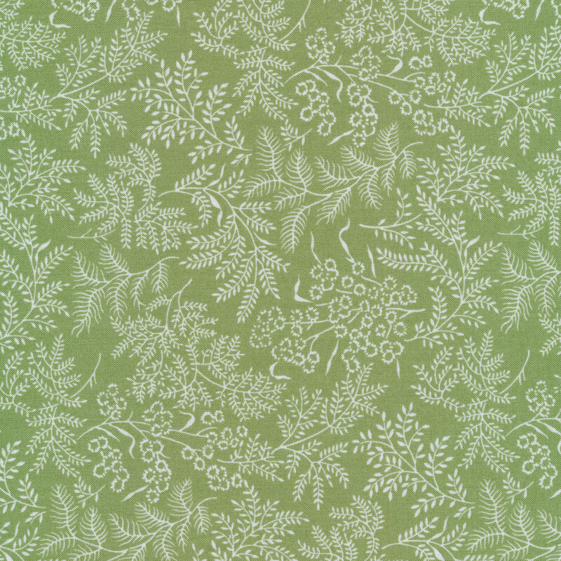 Fabric with white leaves and vines all over a medium green background