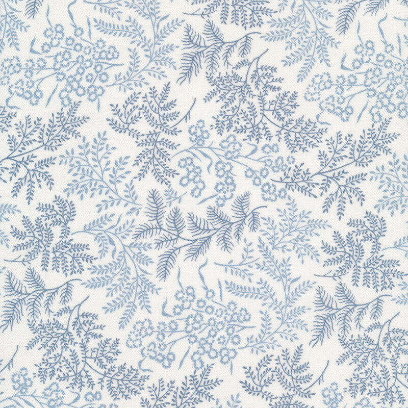 Fabric with light blue leaves and vines all over a cream background