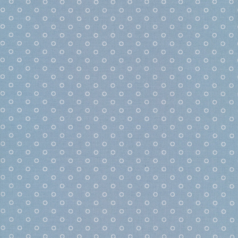 Light blue fabric with white circle dots all over