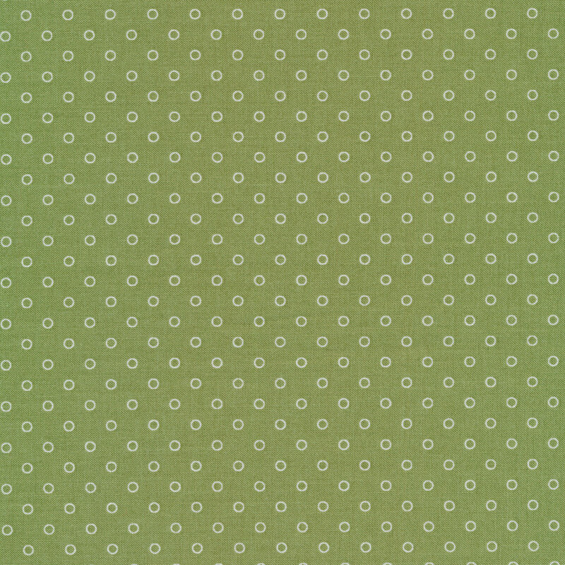 Green fabric with white circle dots all over