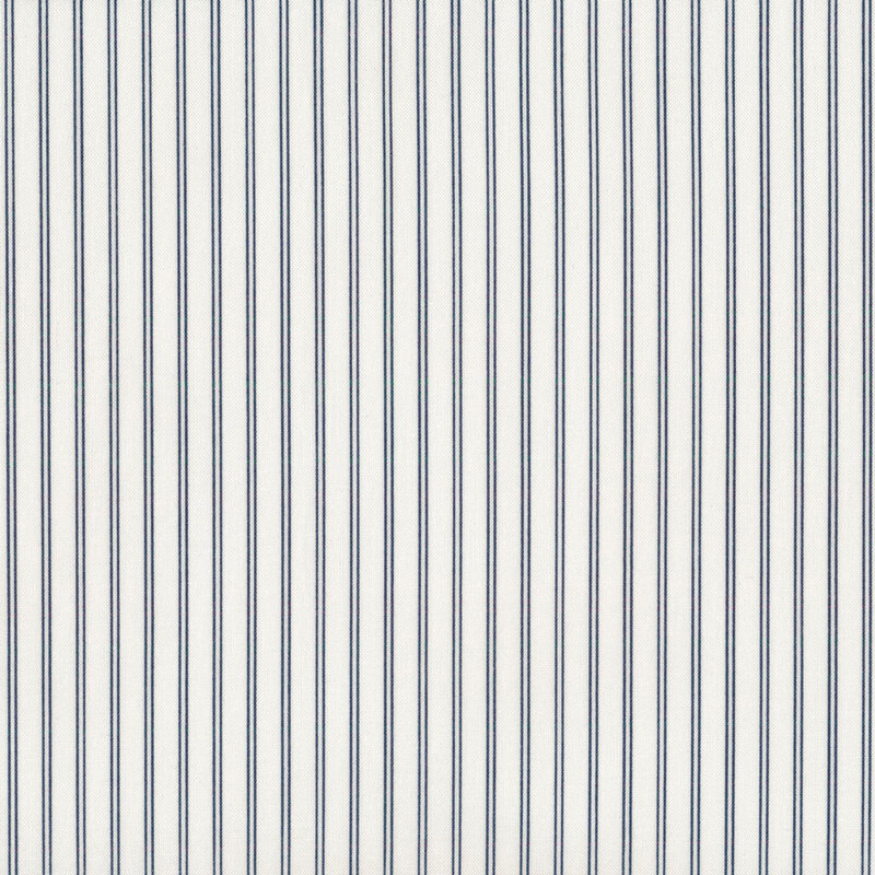 Fabric with navy blue stripes all over a cream background