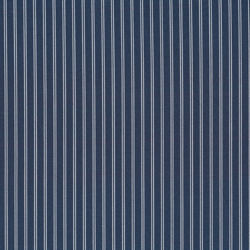 Fabric with white stripes all over a navy blue background