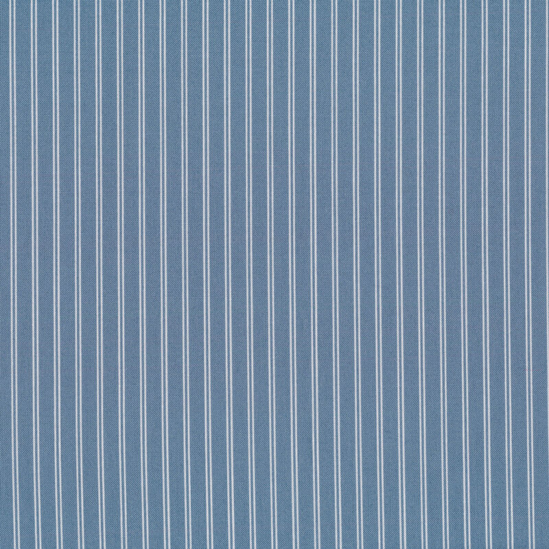 Fabric with white stripes all over a blue background