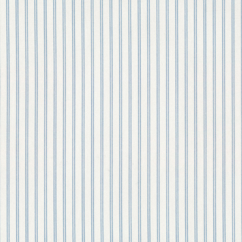 Fabric with blue stripes all over a cream background