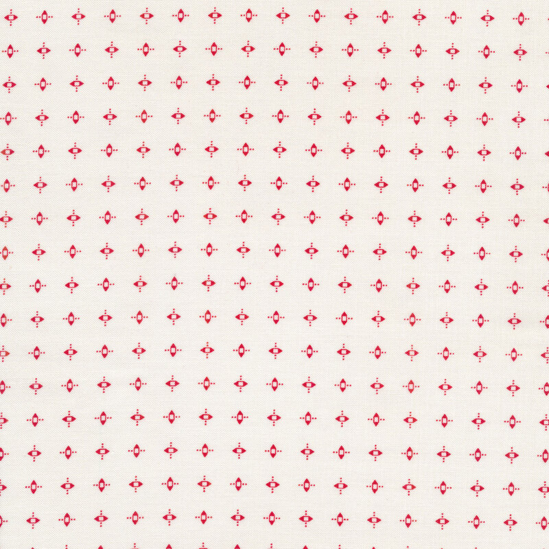 Fabric of an array of red geometric shapes on a white background