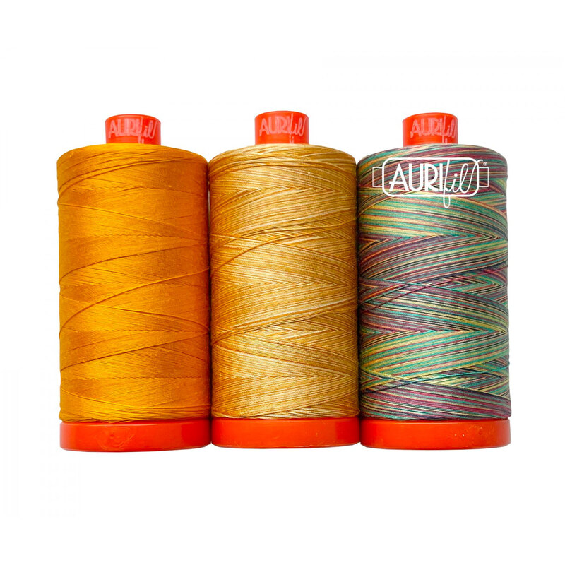 Set of three gold thread spools from Aurifil's Golden Shrimp Plant thread set