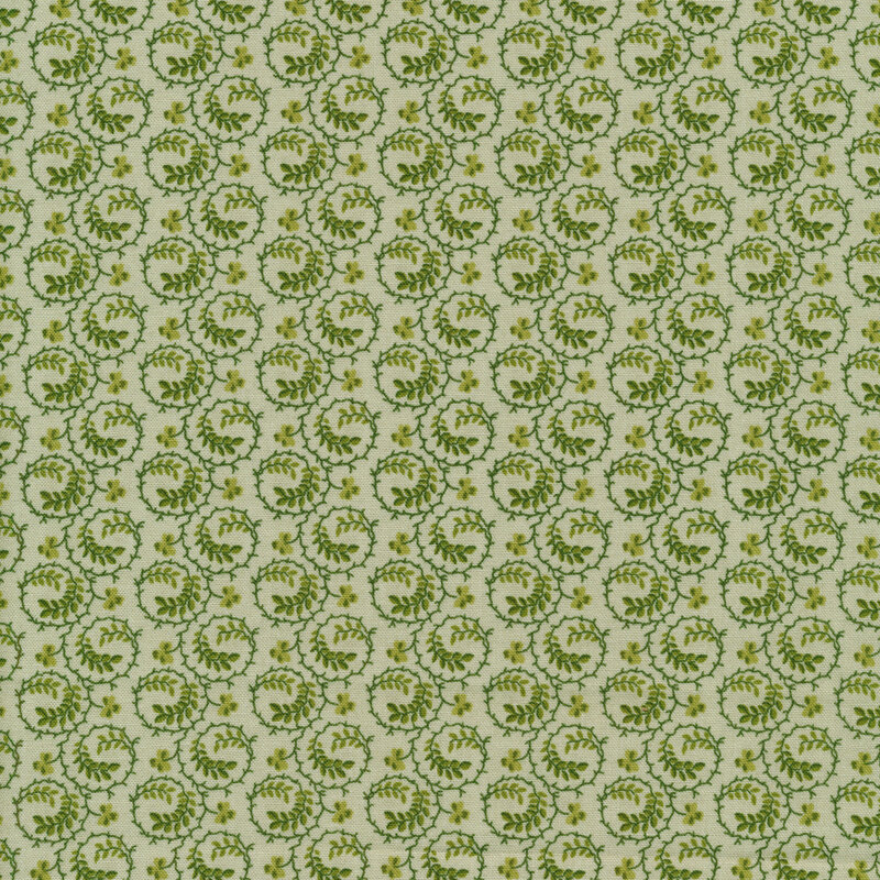 Tonal light green fabric with dark green shamrock swirls