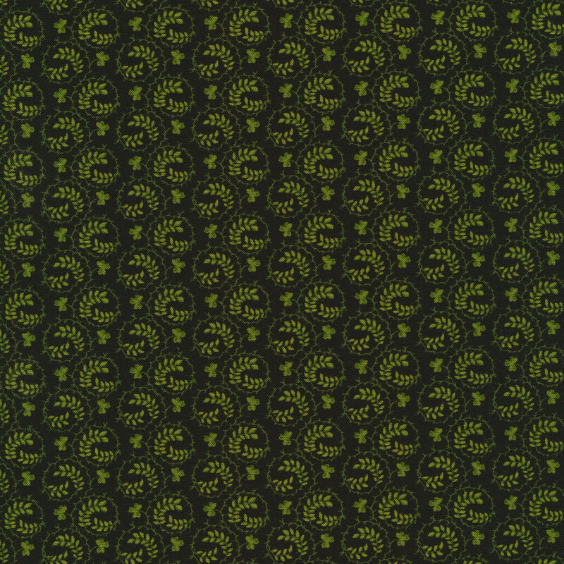 Black fabric with dark green shamrock swirls all over