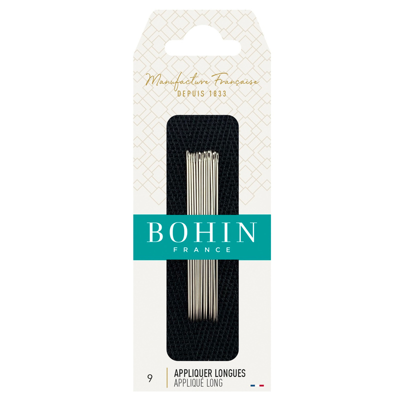 Package of Bohin long applique needles, featuring nine needles against a black background. The entire package is set against a white background.